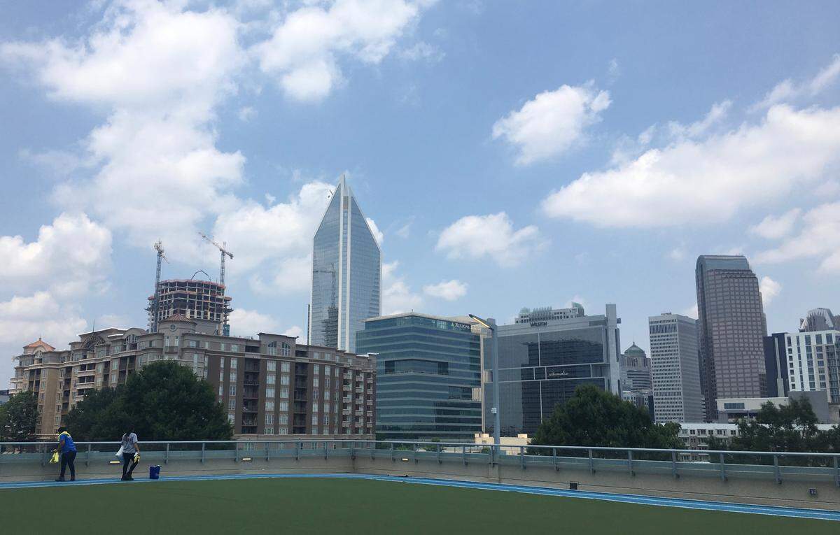 The Dowd YMCA’s newly renovated outdoor track features a view of the Charlotte skyline.