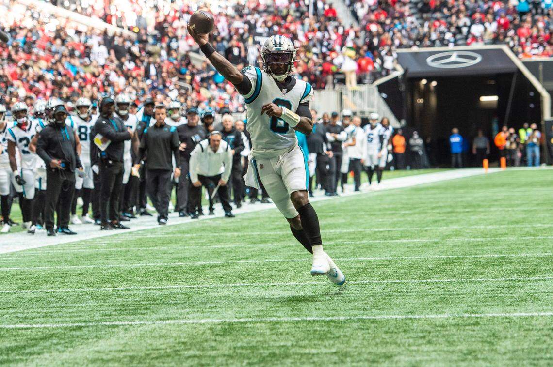 Panthers quarterback P.J. Walker throws a pass against Atlanta Sunday.