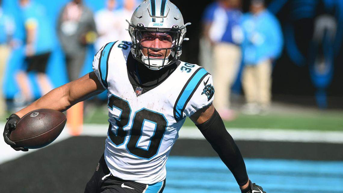 Carolina Panthers running back Chuba Hubbard turns to celebrate his touchdown run against the Tampa Bay Buccaneers during second half action at Bank of America Stadium in Charlotte, NC on Sunday, October 23, 2022. The Panthers defeated the Buccaneers 21-3.