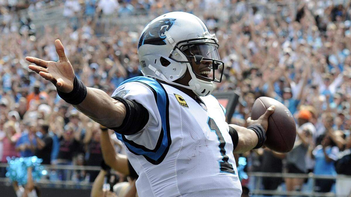 Carolina Panthers quarterback Cam Newton scored two rushing touchdowns as the Panthers defeated the Cincinnati Bengals on Sunday at Bank of America Stadium.