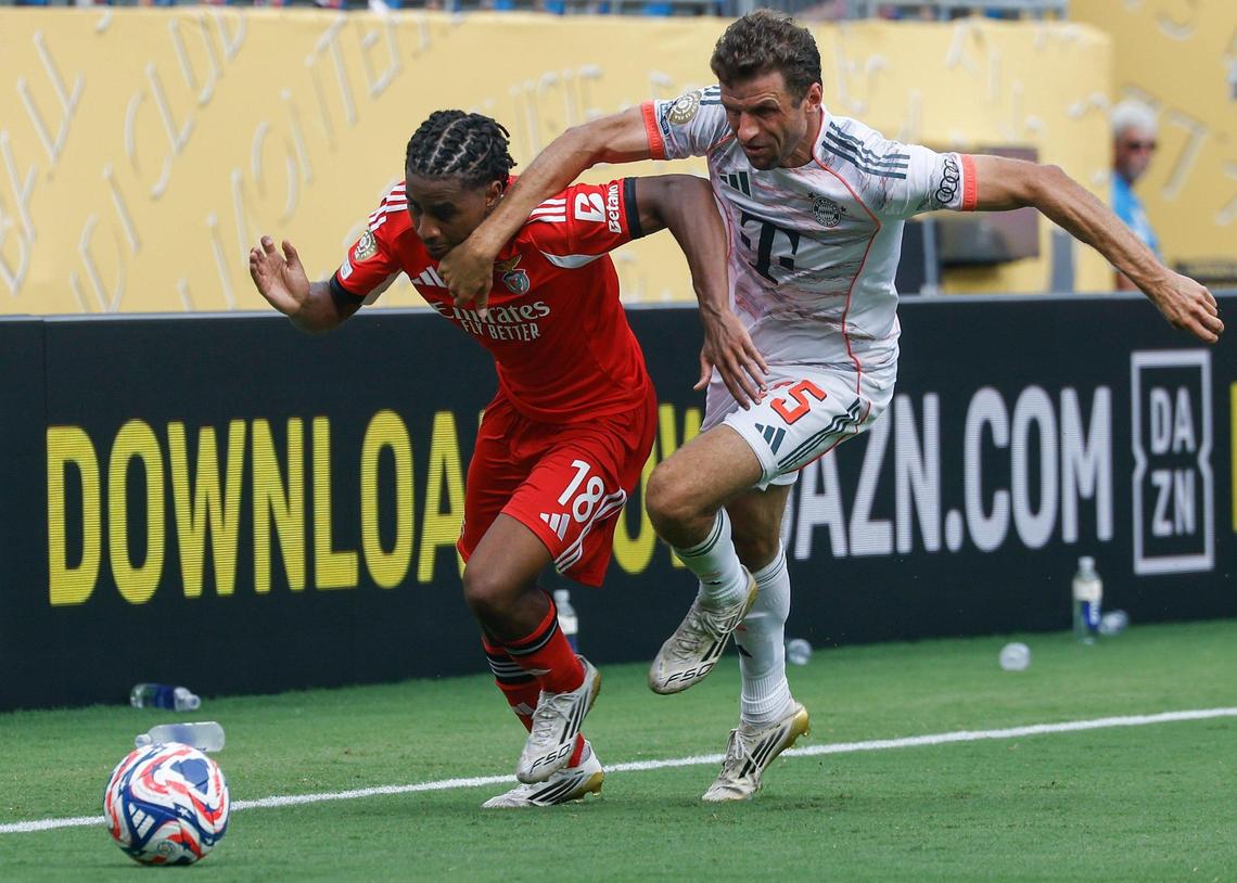 Bayern München’s forward Thomas Mueller, right, throws a arm in the face of S.L. Benfica’s midfielder Leandro Barreiro as they chase after the ball during the FIFA Club World Cup at Bank of America Stadium in Charlotte, NC on Tuesday, June 24, 2025.