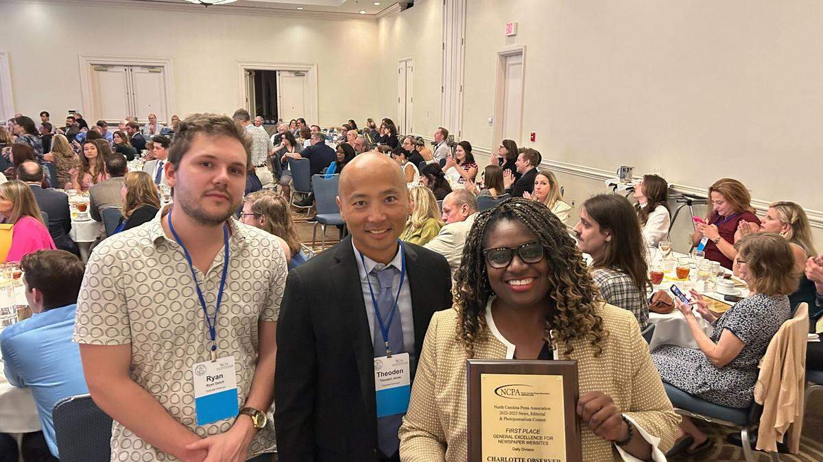 From left: Charlotte Observer Reporters Ryan Oehrli and Théoden Janes stand with Executive Editor Rana L. Cash, Thursday Aug. 24, 2023, during the annual North Carolina Press Association awards dinner.