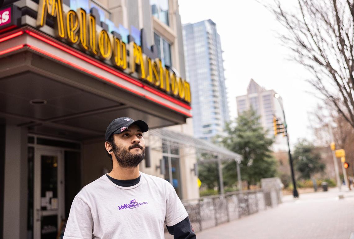 Malik Lloyd poses for a portrait outside of Mellow Mushroom in Charlotte, N.C., on Wednesday, January 3, 2024.
