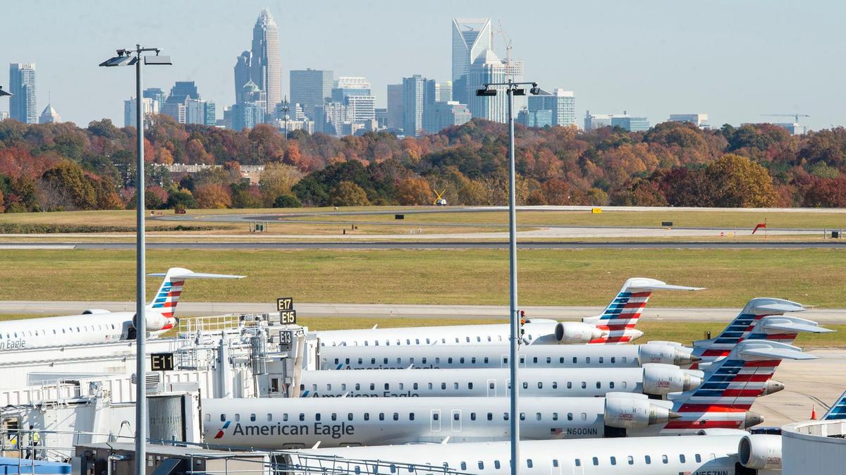 American Airlines planes sit at terminals at Charlotte Douglas International Airport on Tuesday, November 16, 2021 in Charlotte, NC.