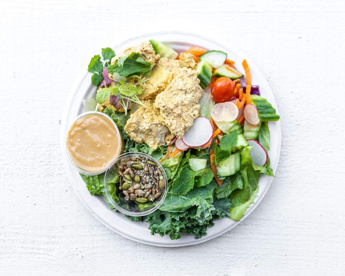 The Salad Du Jour is an option at Plant Joy that reflects the weekly menu at Nourish Charlotte. The dish connects the two sister brands. Salad pictured: Tandoori Tofu salad with Curry Vinaigrette.