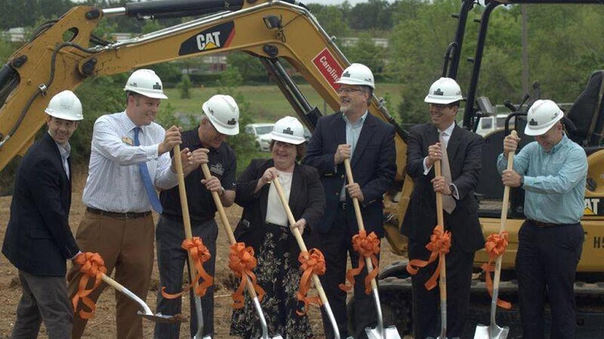 Executives break ground on Monarch’s new facility.