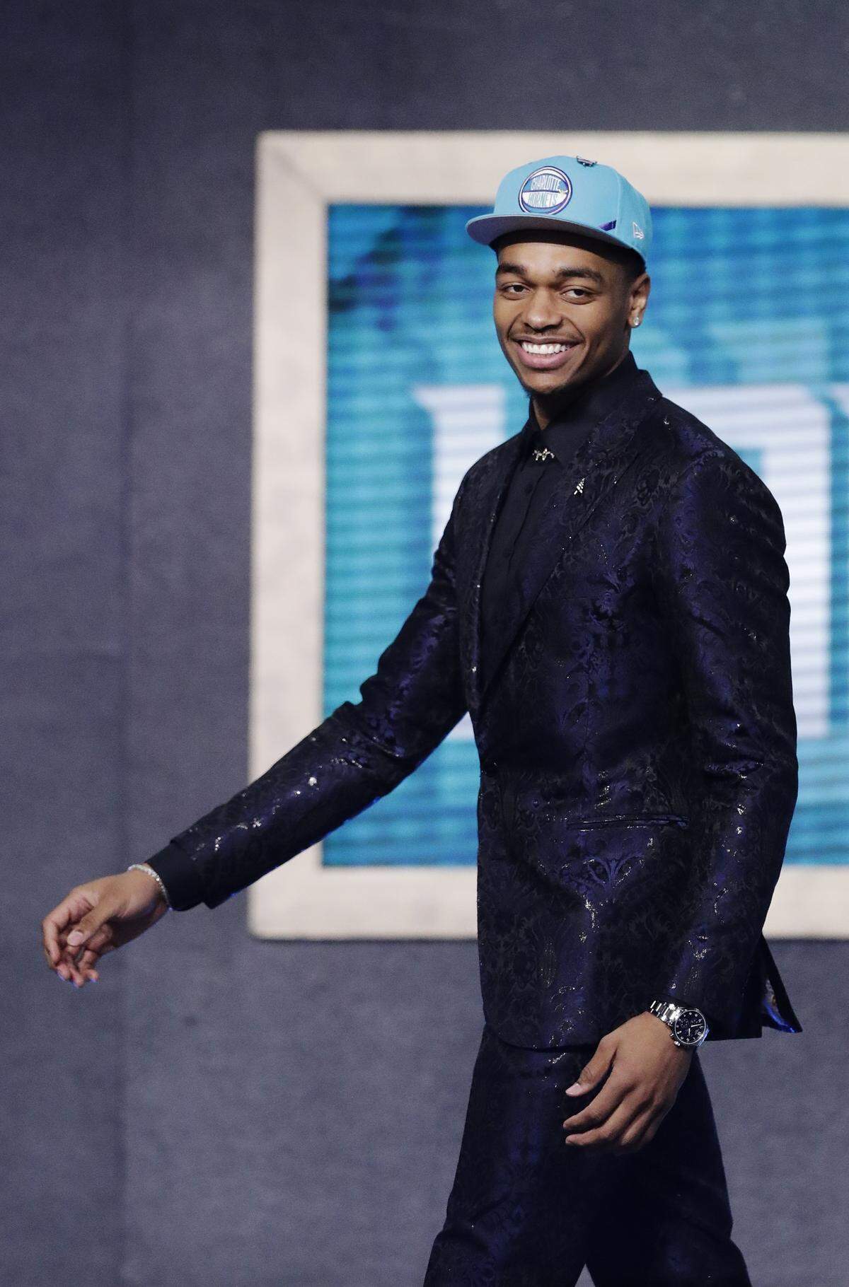 Kentucky forward PJ Washington is all smiles as he walks on stage after the Charlotte Hornets selected him with the 12th pick overall in the NBA draft Thursday.
