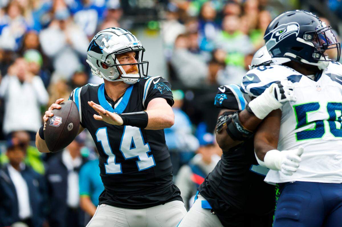 Carolina Panthers quarterback Andy Dalton (14) throws against Seattle on Sept. 24. Although the Panthers lost the game, Dalton led the team to 27 points - the only time the Panthers have scored more than 17 all season.