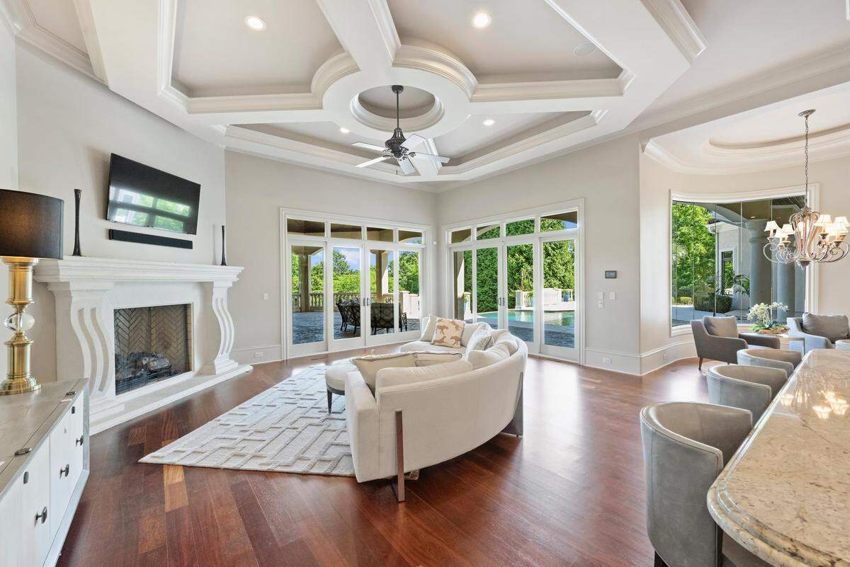 The mansion includes hardwood&nbsp;flooring&nbsp;throughout, Michelle Rhyne, global real estate adviser with Premier Sotheby’s Lake Norman office said in a statement. 