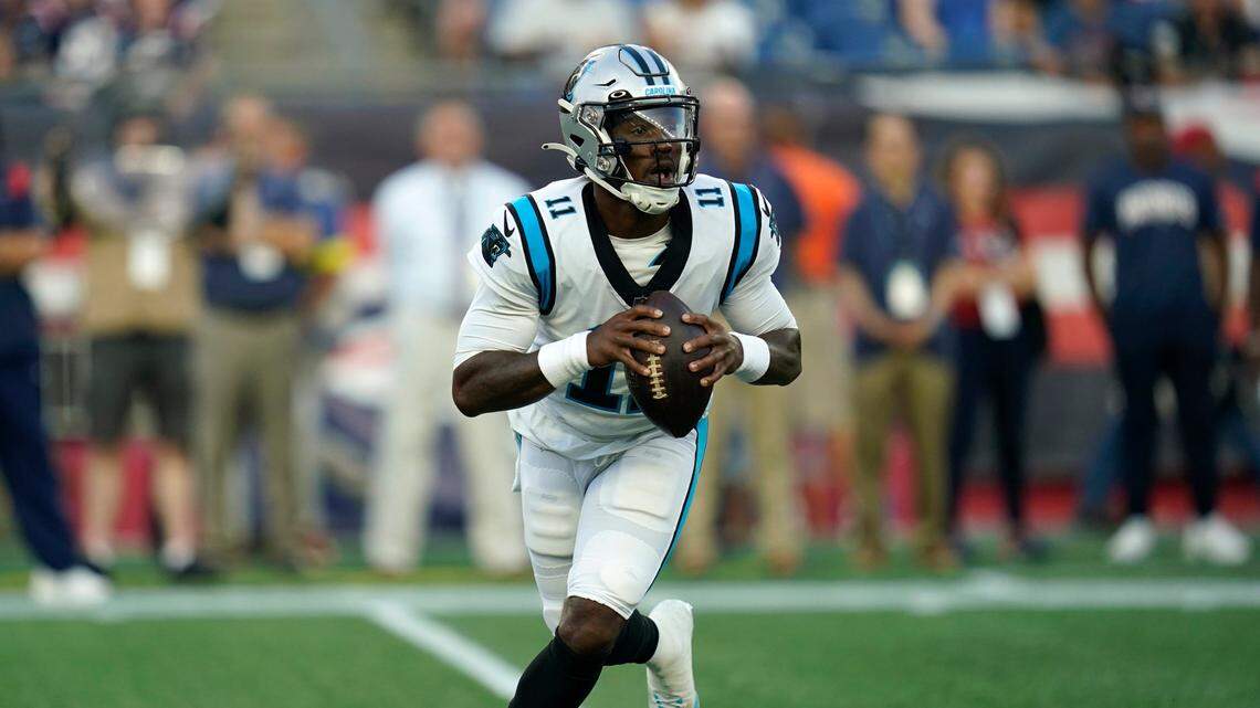 Carolina Panthers quarterback PJ Walker (11) runs with the ball in the first half of a preseason NFL football game against the New England Patriots, Friday, Aug. 19, 2022, in Foxborough, Mass. (AP Photo/Charles Krupa)