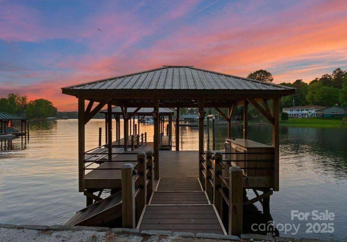 The Martin Truex mansion has this dock on its nearly five, gated waterfront acres on Lake Norman.
