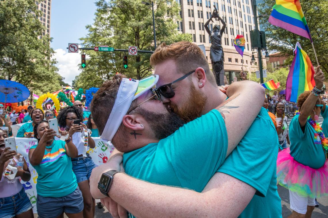 The Gaston County manager ordered this photograph of two newlywed men kissing at the 2019 Charlotte Pride Parade & Festival pulled from a photography exhibit at the Gaston County Museum, according to a county statement and the photographer, Grant Baldwin.