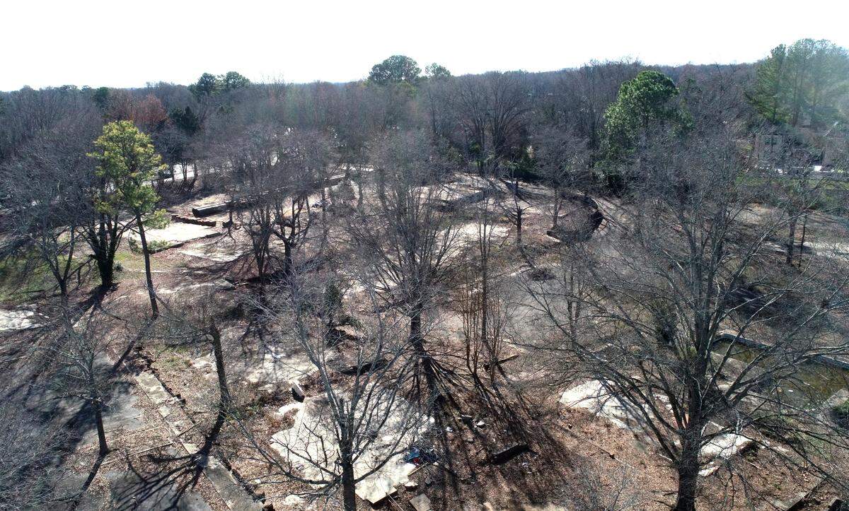 Concrete slabs mark the former apartment homes at Carmel On Providence property in Charlotte.