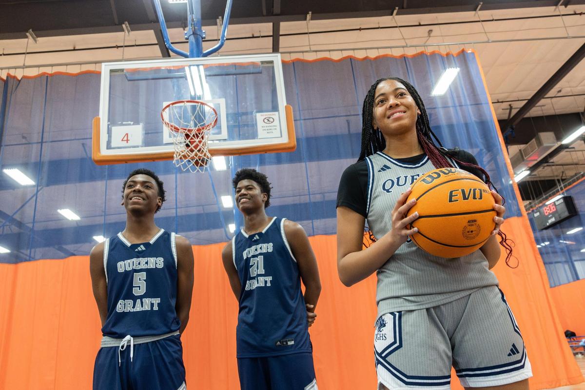 Queens Grant siblings, from left, Chucky Smith, Chase and Casey pose for a portrait at Carolina Courts in Indian Trail, N.C., on Wednesday, February 26, 2025.