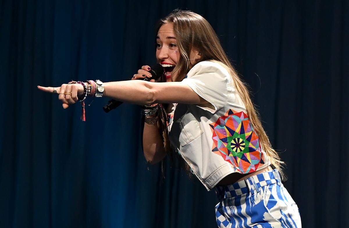 Contemporary Christian music singer Lauren Daigle points to fans as she performs during her Kaleidoscope Tour at Spectrum Center in Charlotte, NC on Thursday, February 22, 2024.
