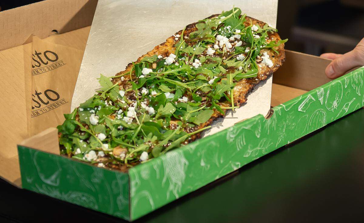 Gusto Farm to Street’s Wild Shroom Pizza ($9.95) has a cauliflower crust topped with with balsamic mushroom truffle sauce, smoked gouda, mozzarella, cremini mushrooms, baby arugula, goat cheese and balsamic drizzle.