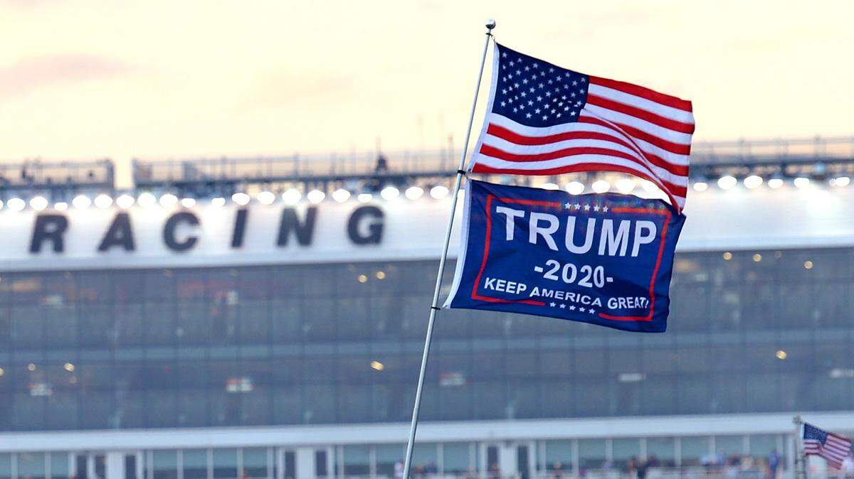 A flag flies in the infield at Daytona International Speedway displaying support for President Donald J. Trump’s reelection in 2020 on Thursday, Feb. 13, 2020.