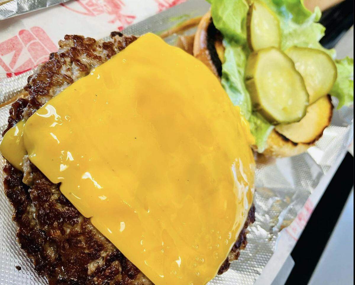 The plant-based burgers are served on vegan buns with Follow Your Heart’s plant-based cheese and Romeo’s homemade vegan sauce.