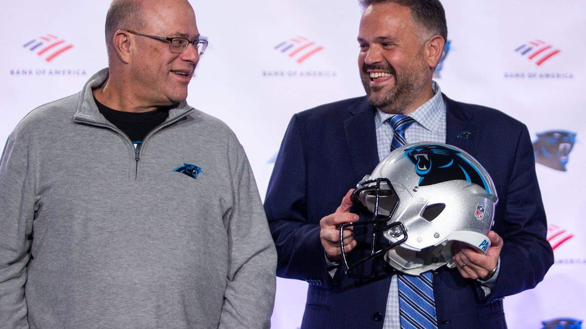 Panthers owner David Tepper and head coach Matt Rhule laugh before taking group photos at the Atrium Health Dome in Charlotte, NC on Wednesday, January 8, 2020.