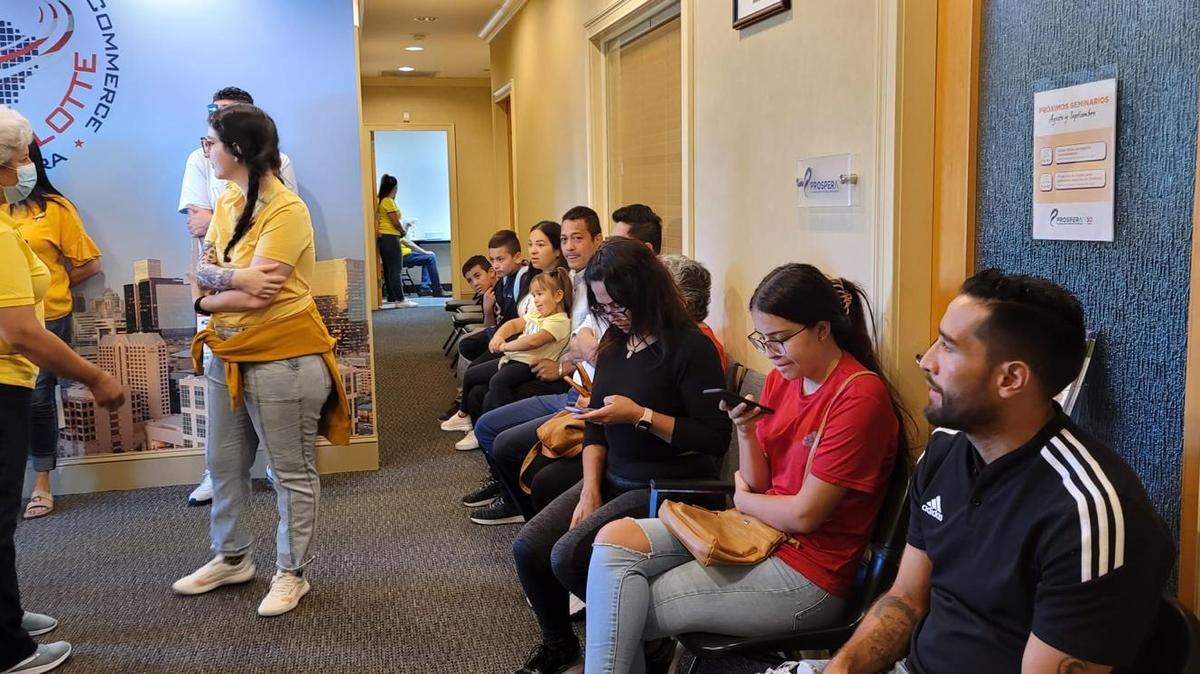 People wait in line at Charlotte’s pop-up Colombian consulate in February 2023, where there were more interested attendees than appointment slots.