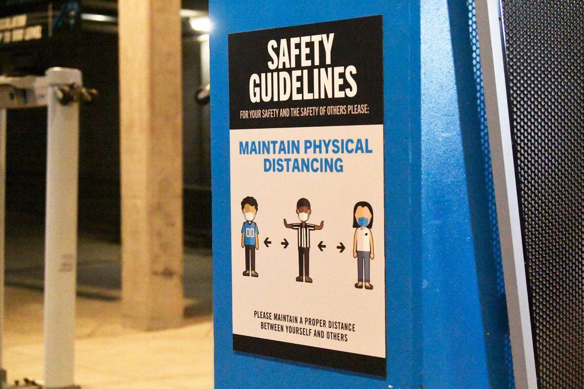 Social distancing and safety signs are displayed inside inside of Bank of America Stadium during Carolina Panthers training camp on Saturday, August 22, 2020.