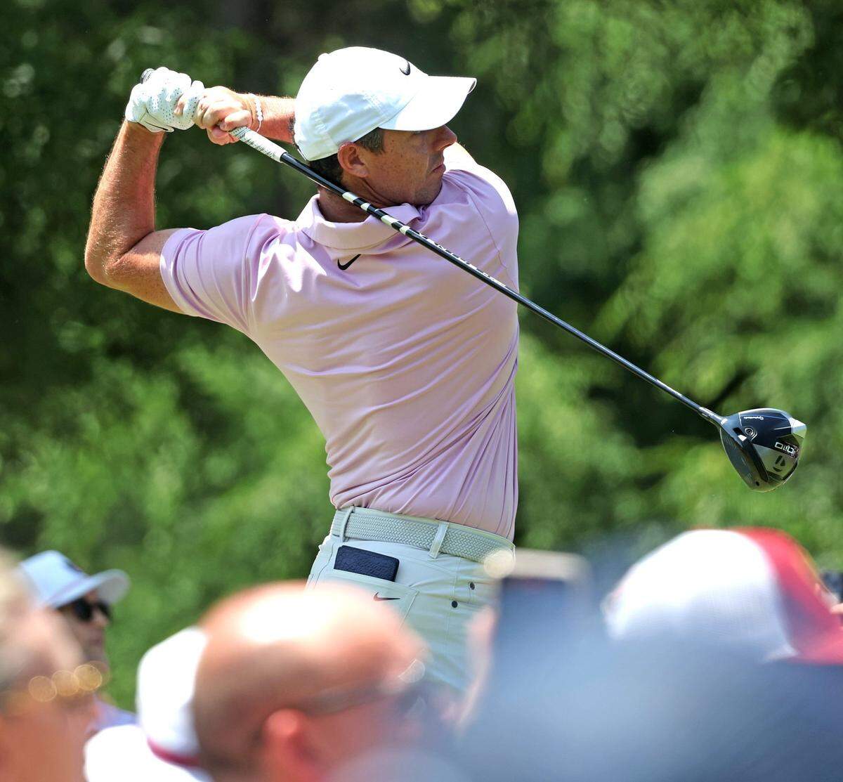 Rory McIlroy follows through on his drive from the second tee box during the final round of the Wells Fargo Championship at Quail Hollow Club in Charlotte, NC on Sunday, May 12, 2024.