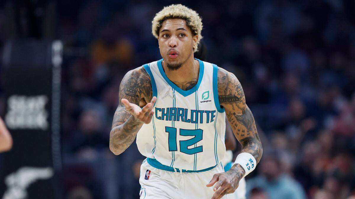 Charlotte Hornets’ Kelly Oubre Jr. reacts after making a three point basket during the first half of an NBA basketball game against the Cleveland Cavaliers, Wednesday, March 2, 2022, in Cleveland. (AP Photo/Ron Schwane)