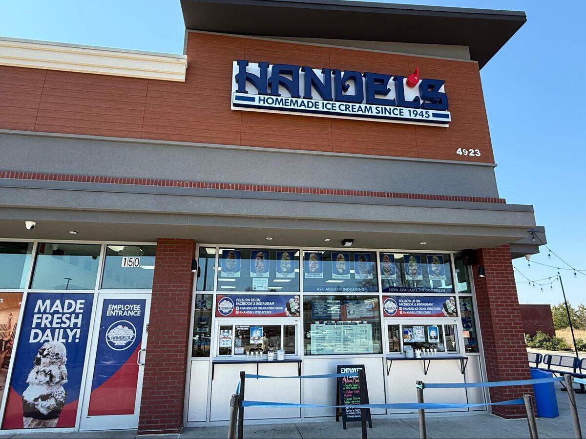 The exterior storefront of a Handel’s Homemade Ice Cream location with a large brand sign above the service windows.