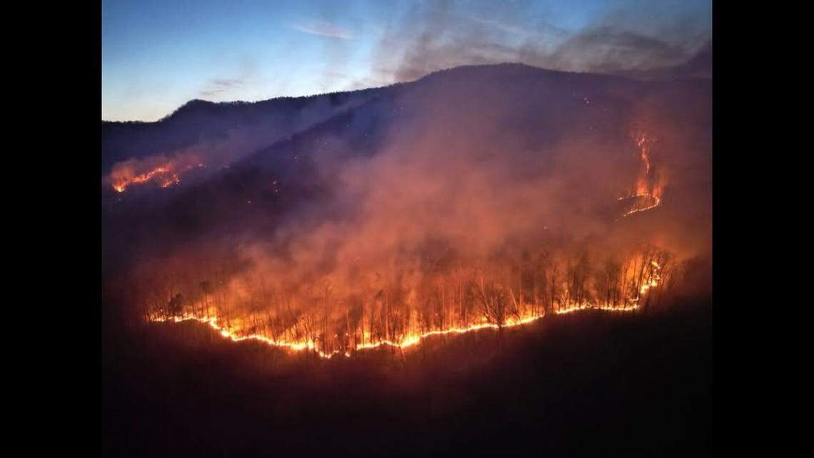 Multiple communities are evacuating in Polk County, North Carolina, due wildfires that have begun consuming buildings, first responders say.