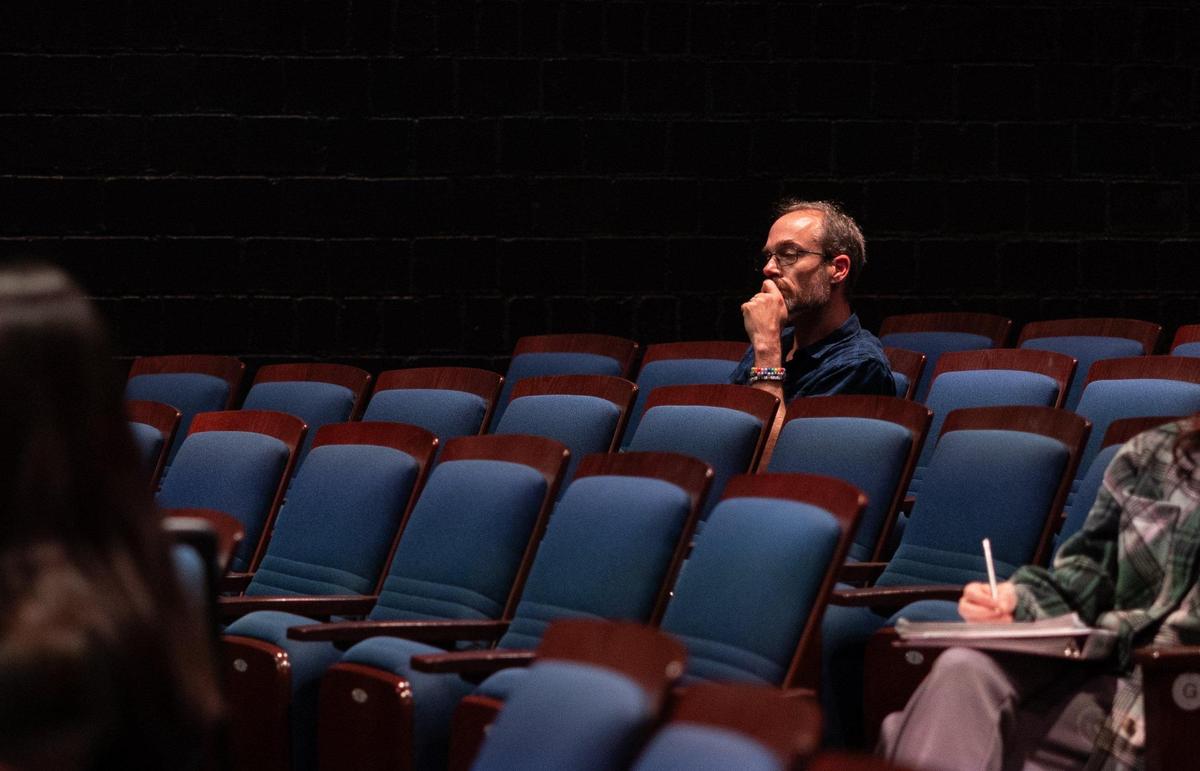 Artistic Director Chris Timmons watches rehearsal for the musical “Violet” at Theatre Charlotte. The musical is about a disfigured woman from Spruce Pine taking a bus trip home to Tulsa, Oklahoma, to be healed.