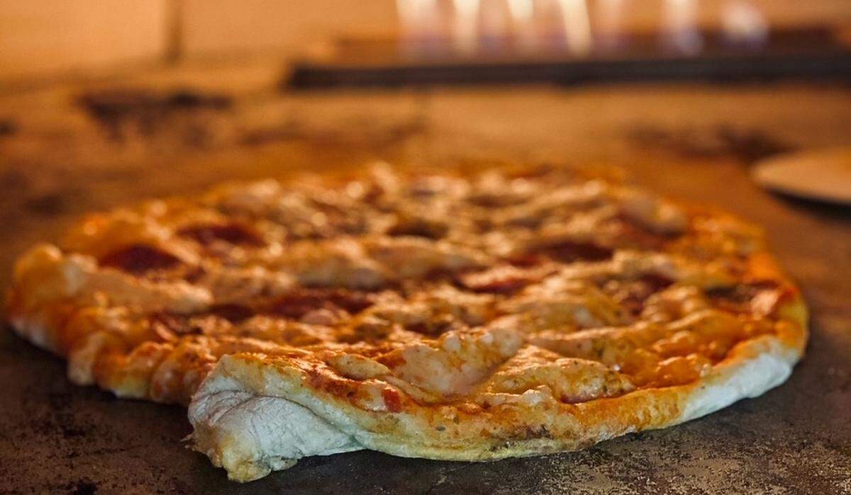 The St. Louis-style pizza will be prepared in a pizza oven from Sorrento, Italy.