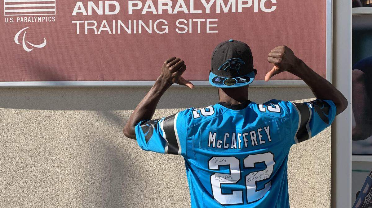 An unlikely bond exists between Panthers RB Christian McCaffrey and blind Paralympian