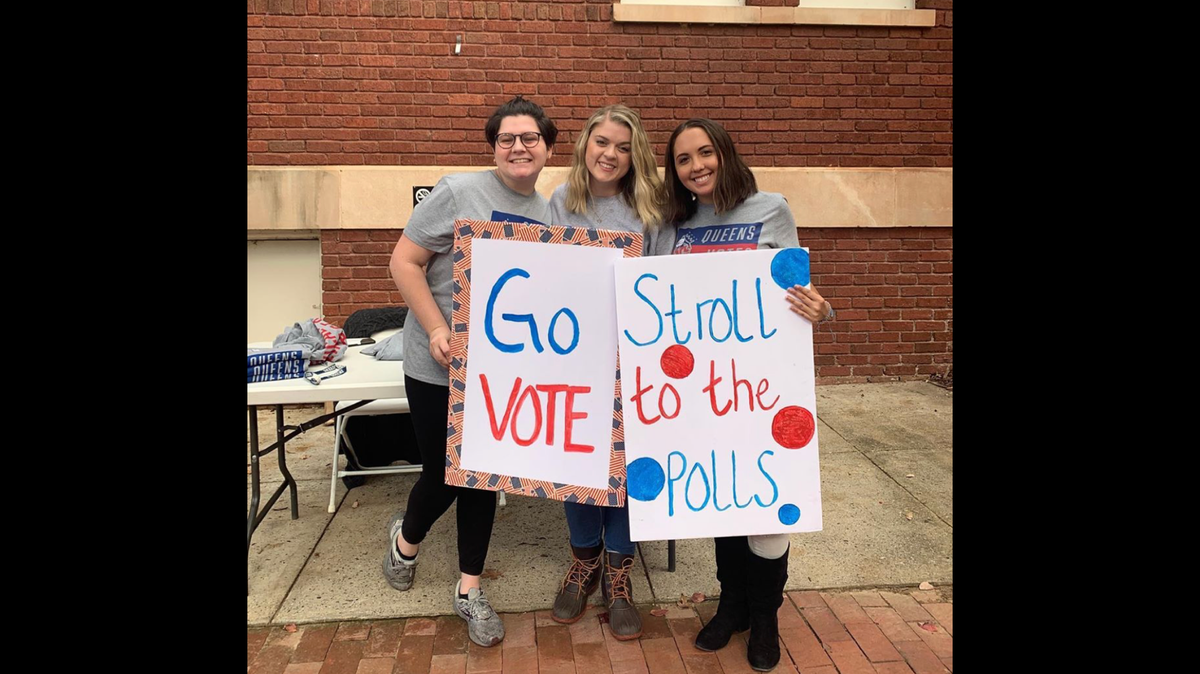 Queens students Liz Fried, Deanna Rohrer and Alyssa Pacheco (left to right) walked voters to the Myers Park Elementary polling location on Election Day 2019.