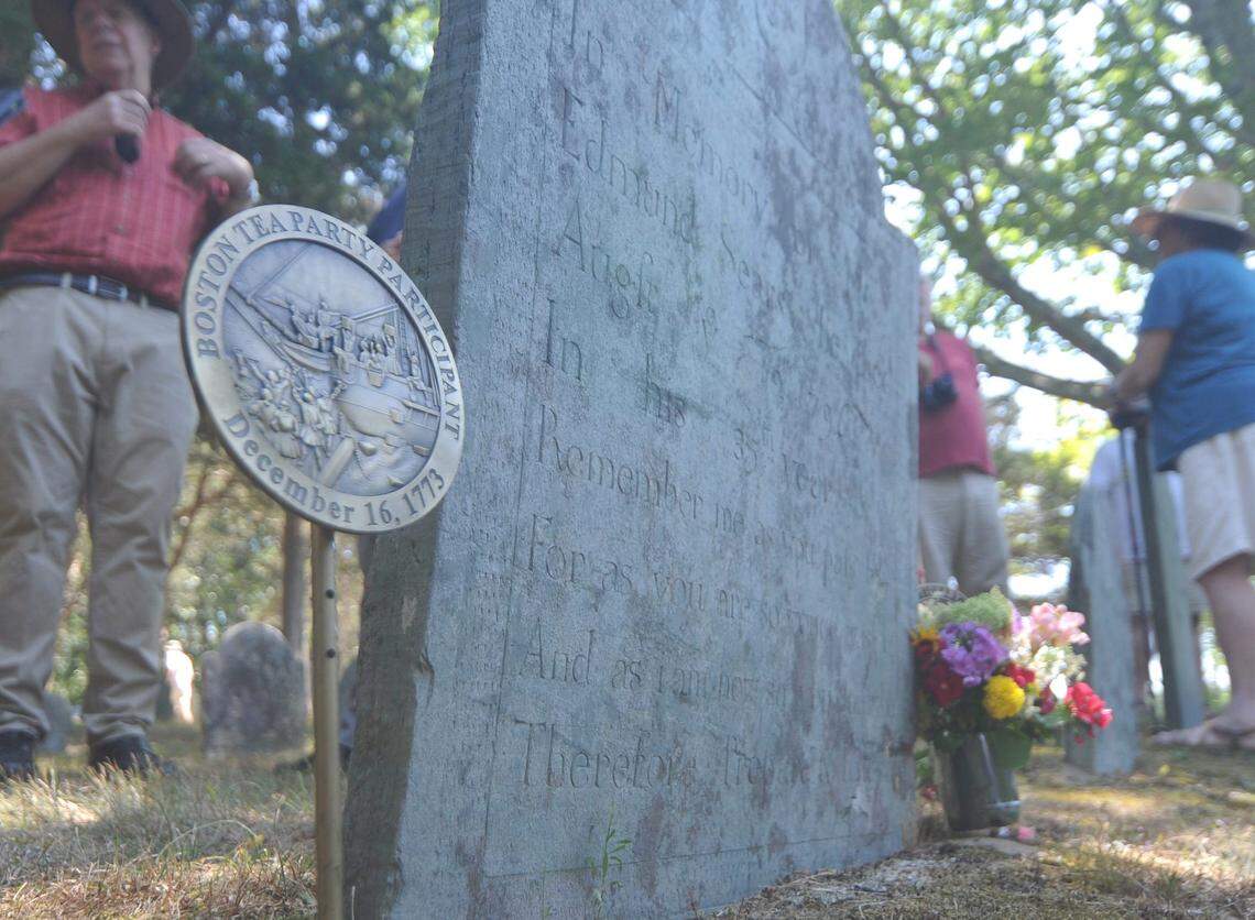 A commemorative marker at the gravesite of Boston Tea Party participant Edmund Sears in Sears Cemetery. Boston remains a popular destination for travelers at Charlotte’s airport.