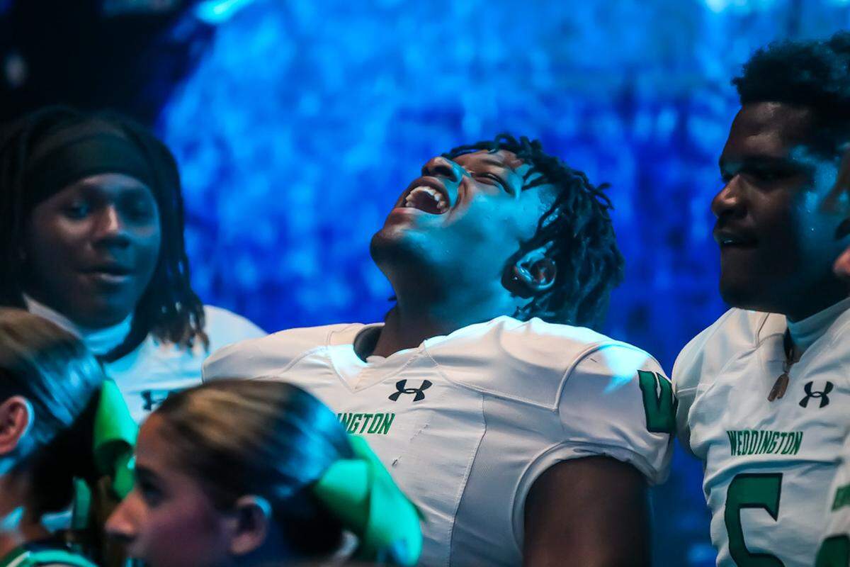 Players from several girls’ flag football teams and players, coaches and cheerleaders from Independence, Myers Park, Providence Day and Weddington High Schools were invited to Bank of America Stadium by the Carolina Panthers for a special media day photo and videoshoot Tuesday