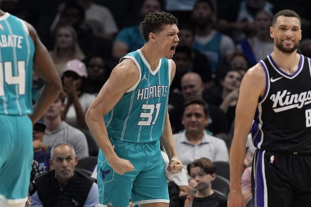 Charlotte Hornets forward Tidjane Salaun (31) reacts to his three point play against the Sacramento Kings during the second quarter at Spectrum Center.