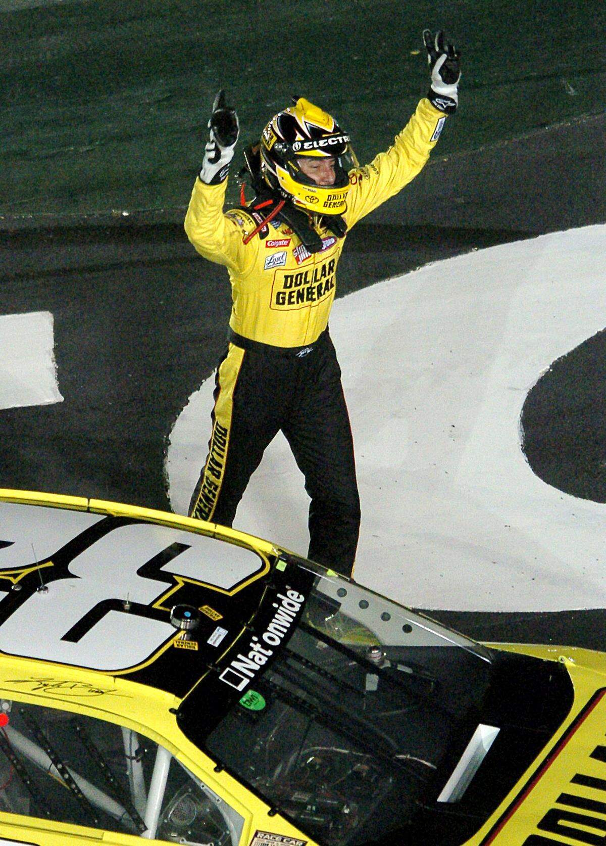 Kyle Busch celebrates his win in the NASCAR Nationwide Series Carquest Auto Parts 300 at Lowe's Motor Speedway, in Concord, North Carolina, Saturday, May 24, 2008. (Jeff Siner/Charlotte Observer/MCT)