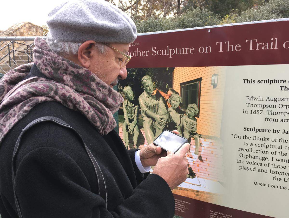 Sculptor Ed Hamilton ponders where his statue of Julius Chambers might reside.