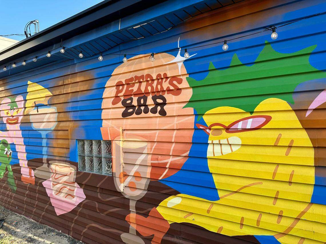 Petra’s is an art gallery, music venue and bar all in one. Its iconic karaoke night takes place on Wednesday evenings. It’s mural outside was done by multidisciplinary artist HNin Nie.