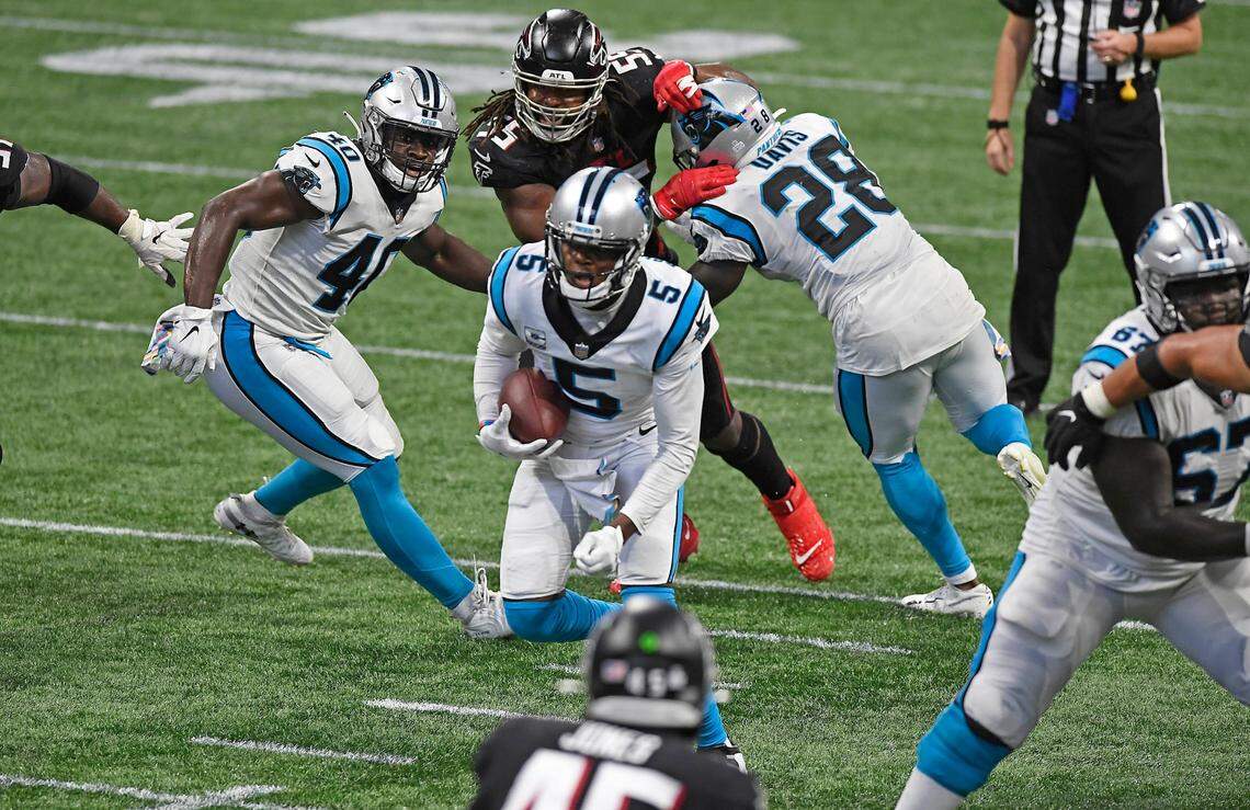 Carolina Panthers quarterback Teddy Bridgewater (5) scrambles against the Atlanta Falcons. Although Bridgewater prefers to throw, he does have an 18-yard TD run this season.