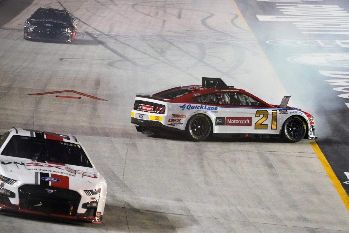 Harrison Burton (21) spins out during a NASCAR Cup Series auto race at Bristol Motor Speedway Saturday, Sept. 17, 2022, in Bristol, Tenn. (AP Photo/Mark Humphrey)