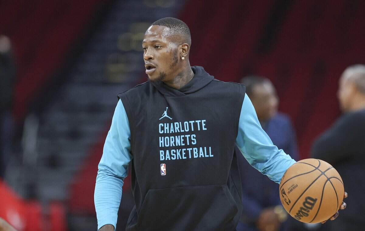 Charlotte Hornets guard Terry Rozier (3) warms up before the game against the Houston Rockets at Toyota Center.