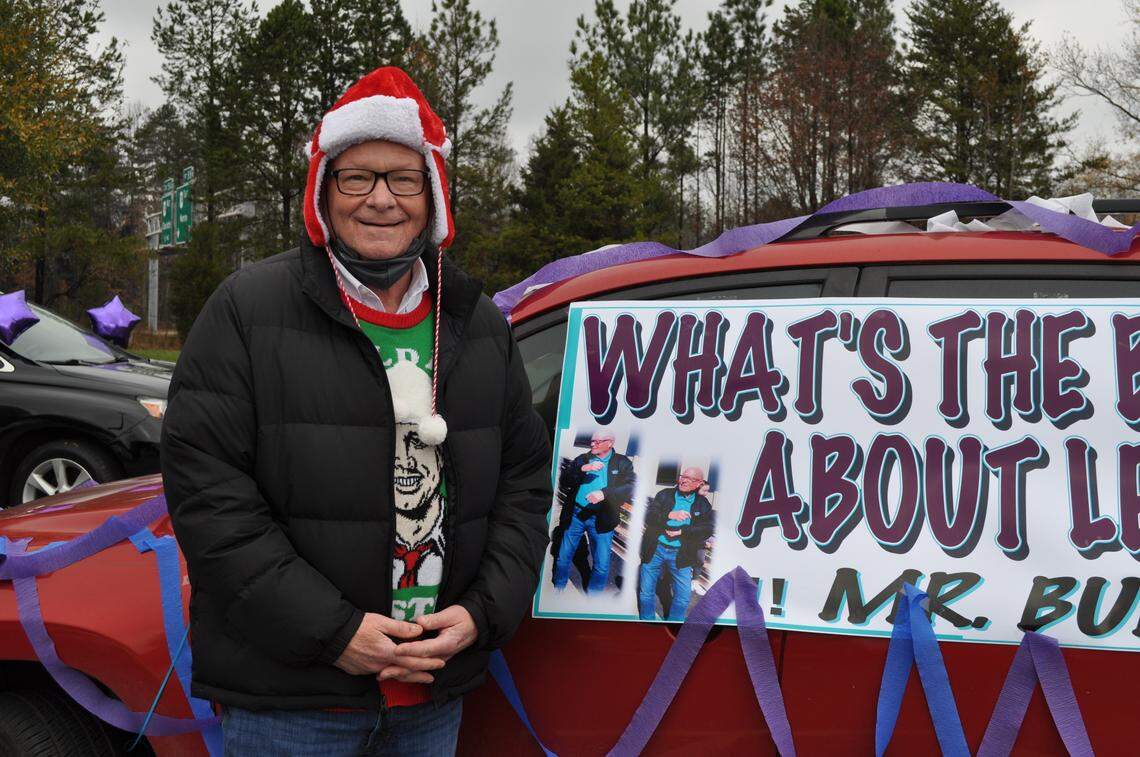 Family members, students and teachers organized a drive-thru retirement parade for Joey Burch, principal at Levine Middle College High School. 