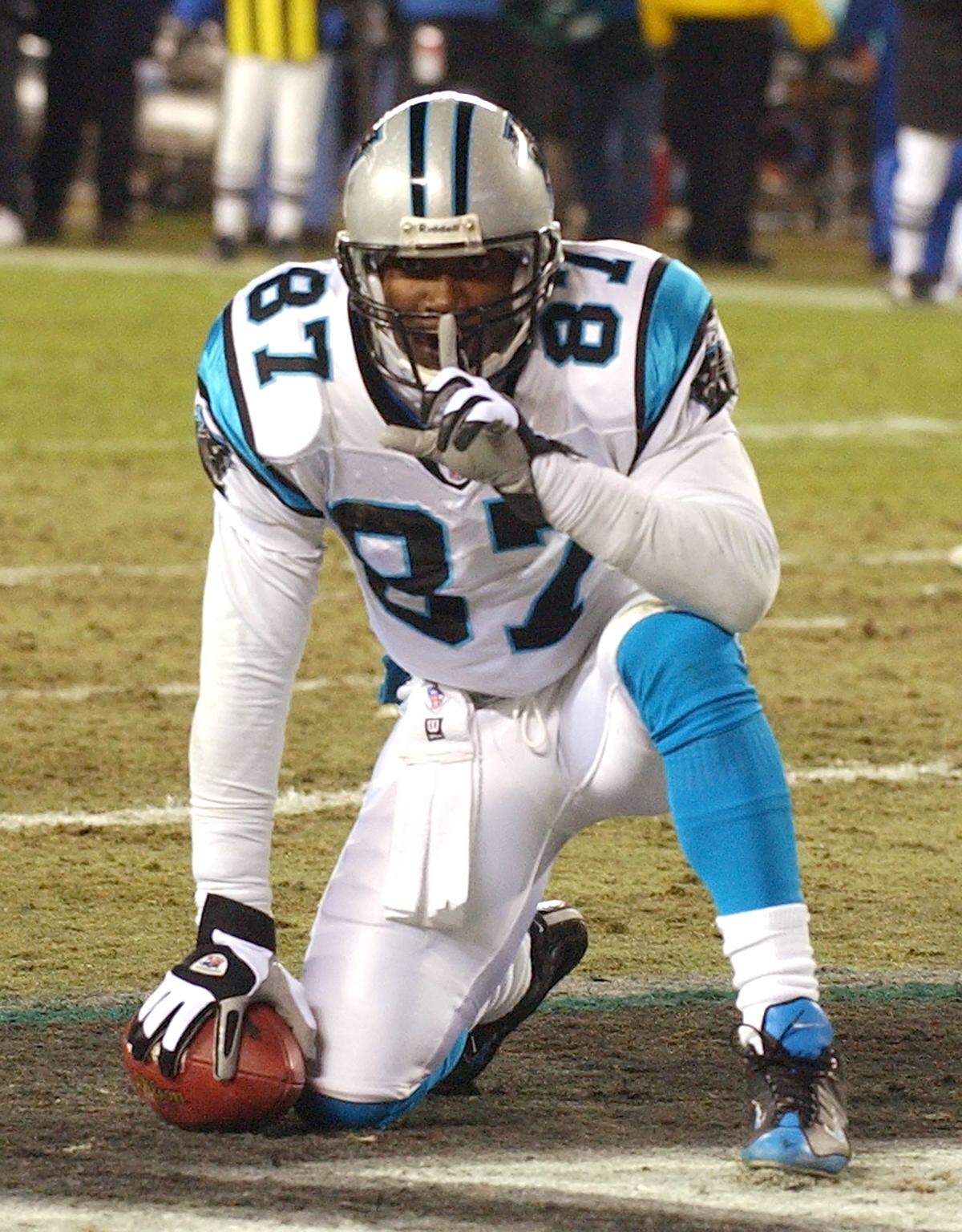 Carolina wide receiver Muhsin Muhammad (87) gestures to quiet the crowd after scoring a touchdown in the NFC Championship game between the Carolina Panthers and Philadelphia Eagles on Jan. 18, 2004. Carolina won, 14-3.