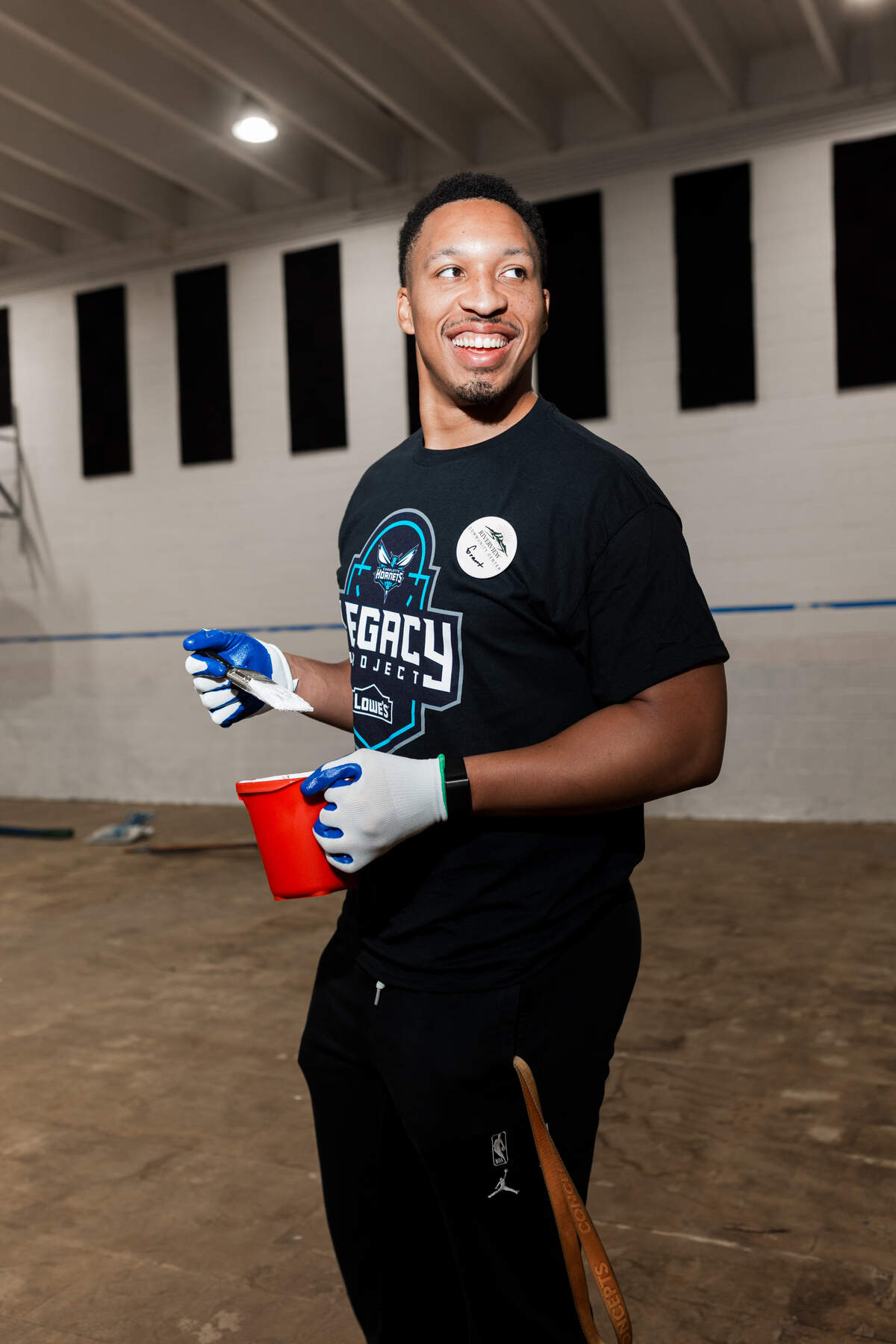 Grant Williams helps out during the Charlotte Hornets’ Legacy Project in Creston, about 25 miles north of Boone.
