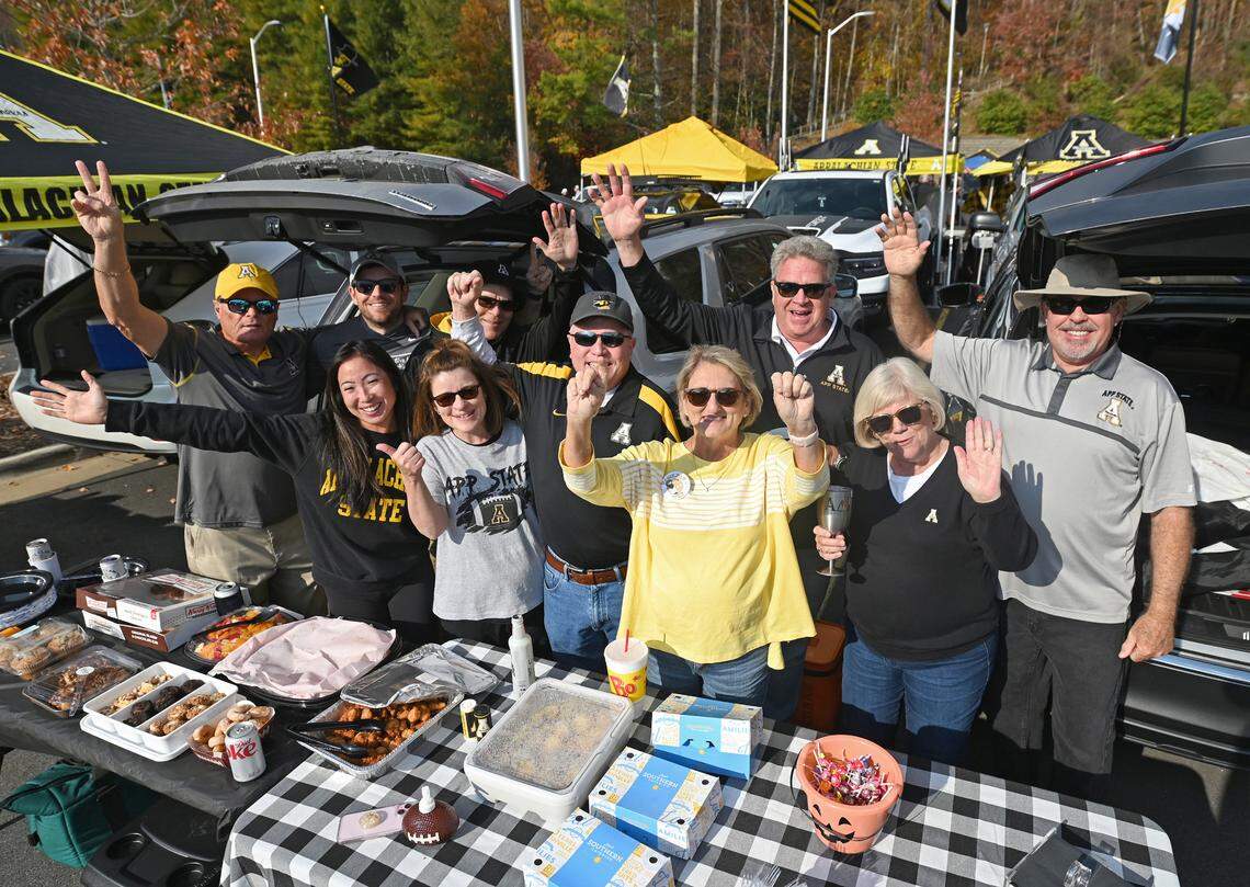 Appalachian State alum Craig White, second row second from right and his tailgating group enjoyed the pregame activities outside Kidd Brewer Stadium in Boone, NC on Saturday, October 26, 2024. Appalachian State played Georgia State in the first home game since Hurricane Helene struck the area. White was in the class of 1982.
