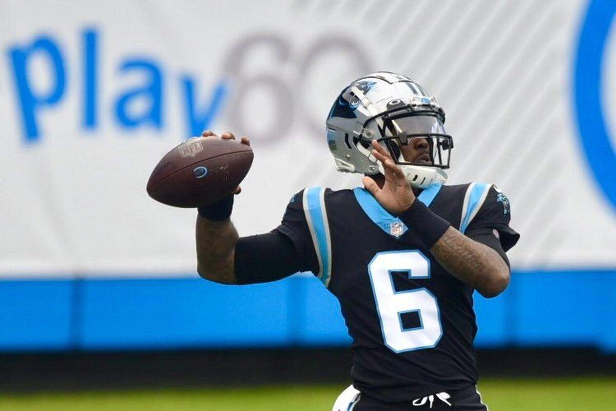 From 2020, P.J. Walker (6) warms up for the Carolina Panthers before their game against the Detroit Lions.
