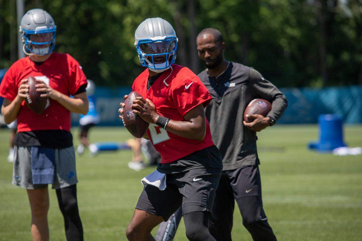 Then-Lions quarterback Hendon Hooker practices during the organized team activities in Allen Park on Thursday, May 23, 2024.