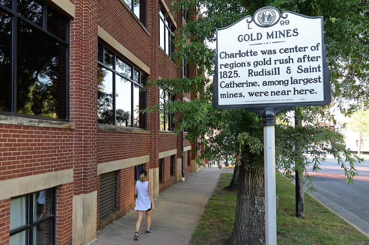 A historical marker stands along 1300 South Boulevard in Charlotte telling of the city’s early gold mining history.