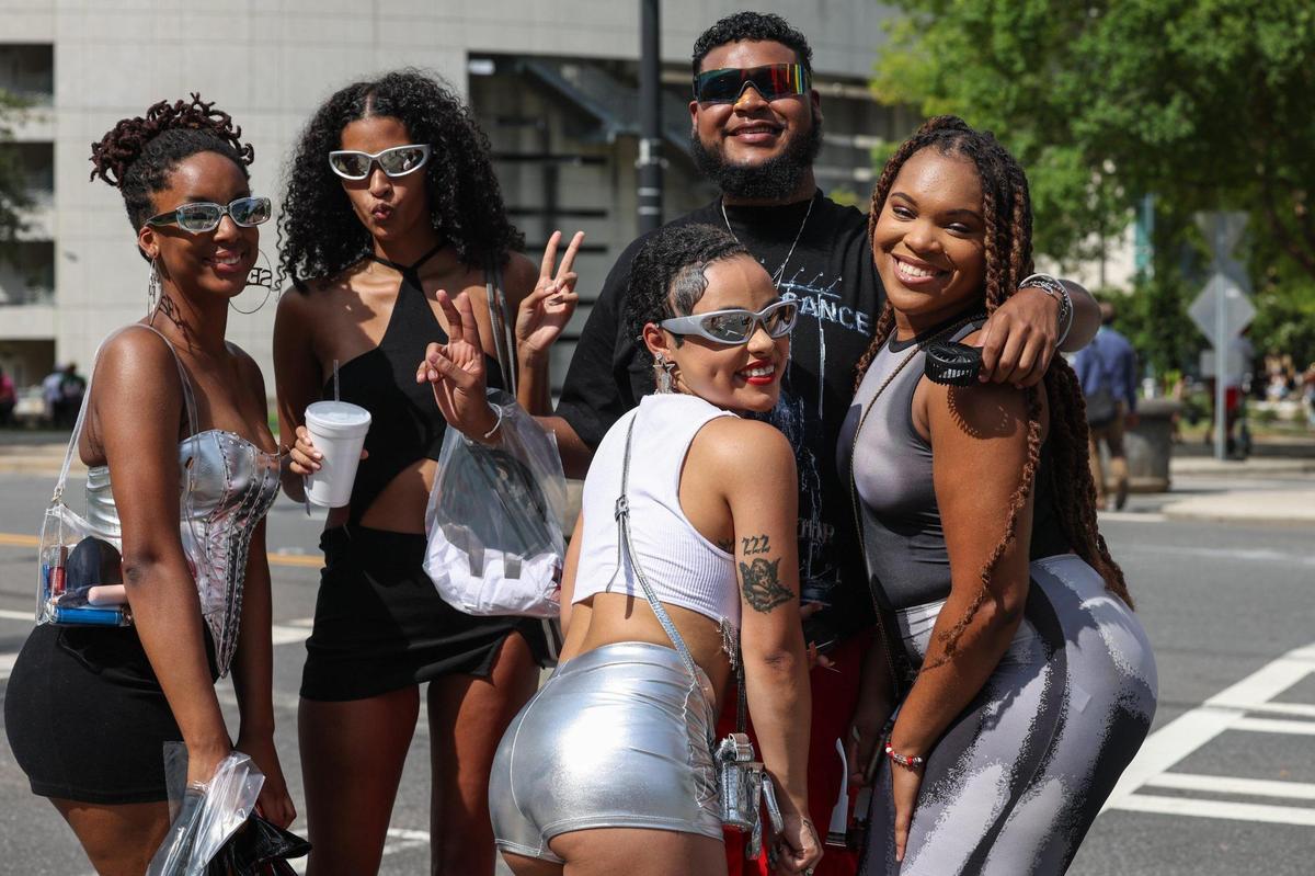 Friends pose outside Bank of America Stadium before seeing Beyoncé tonight at Bank of America Stadium on Wednesday, August 9, 2023 in Charlotte, NC.